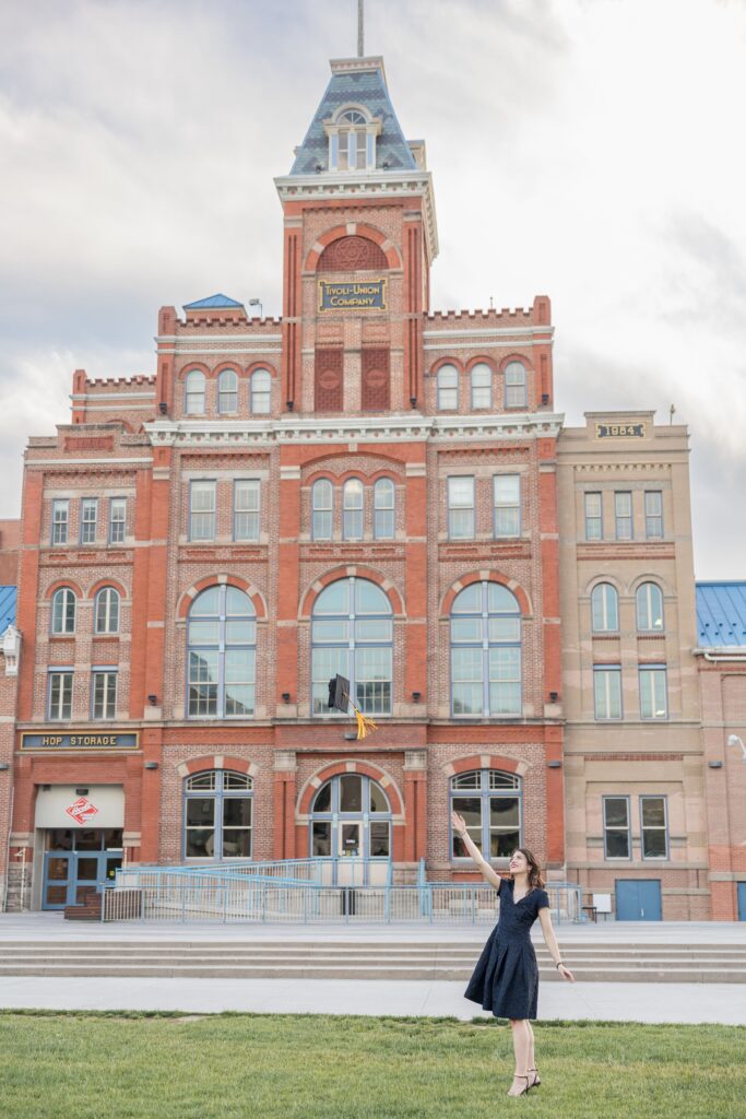 Graduation Photo in front of Tivoli building Denver
